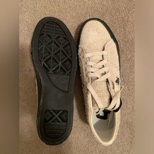 Textured white converse all stars